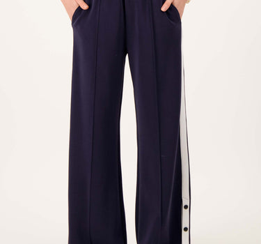 Wide-leg jogger pants with side piping | off-white / dark navy