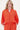 Lyocell ballonmouw blouse coral van Zusss, model draagt een blouse met kanten rand langs de knoopsluiting.