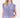 The model is wearing a sky-blue checkered blouse by Zusss, a soft checkered blouse.