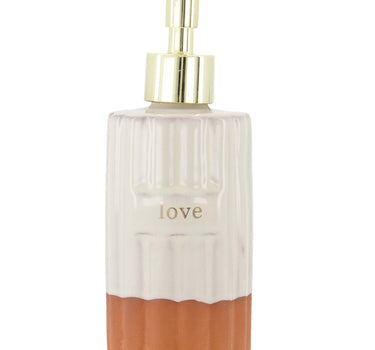 Zeepdispenser van Zusss in off white met terracotta onderkant en gouden pomp.