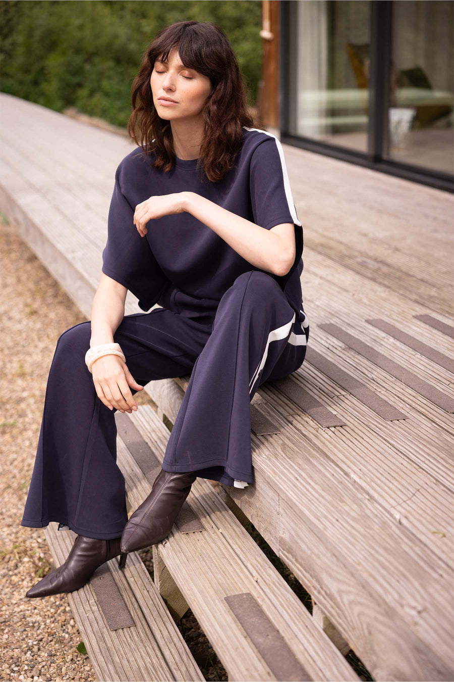 wideleg jogger broek met zijbies | off white / dark navy