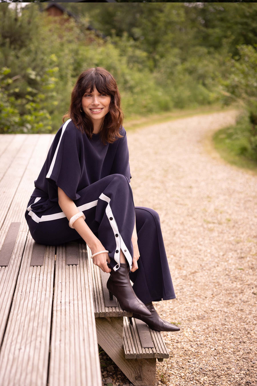 boothals top met bies en vlindermouw | dark navy