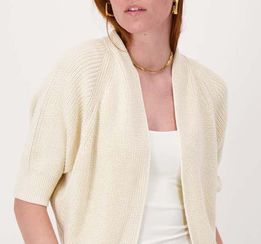 cardigan with batwing sleeves and heart brooch | off-white