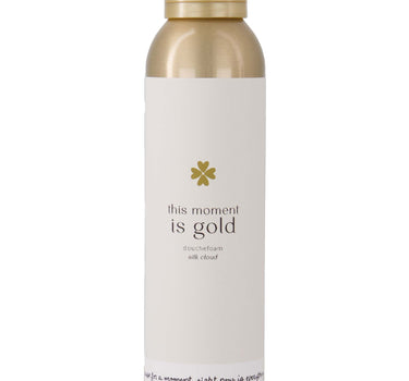 Doucheschuim this moment is gold white van Zusss, cilindrische fles met witte label en gouden dop.