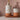 zeepdispenser terracotta love off white van Zusss, keramische fles met gouden pomp op terracotta tray.