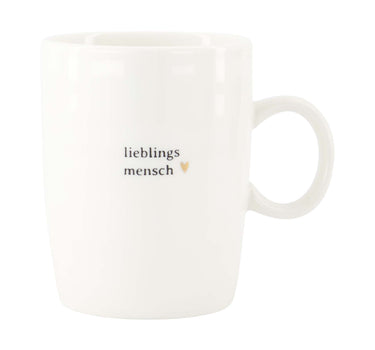 "Lieblings Mensch" tea mug | white/black by Zusss, white ceramic mug with a round handle and an orange heart.