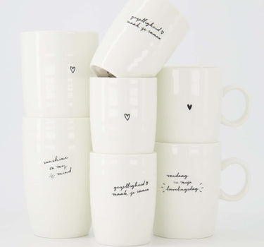 "Cozy" coffee mug in white and black, ceramic mug by Zusss with small hearts