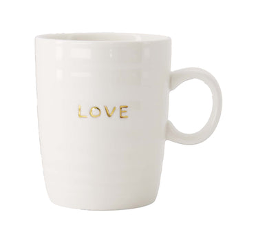 "Love White/Gold" tea mug by Zusss, ceramic mug with gold lettering.