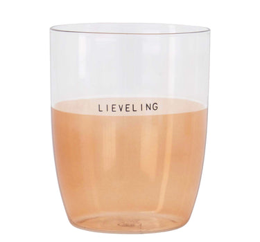 "Lieveling" light pink drinking glass by Zusss; clear glass with a pink base and gold rim.