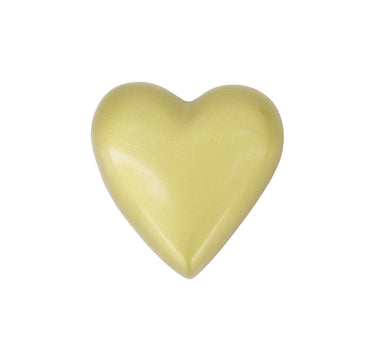Heart-shaped gold-colored napkin ring by Zusss, a gold-colored kitchen accessory.