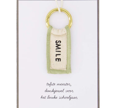 Sleutelhanger kaart liefste meester van Zusss in wit en lichtgroen, met gouden ring van Zusss.