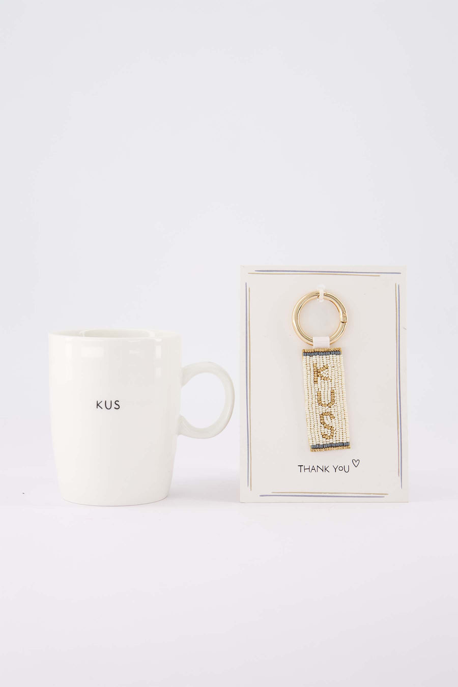 cadeauset Kus - Ansichtkaart met sleutelhanger & theemok - Wit/goud/blauw & wit/zwart